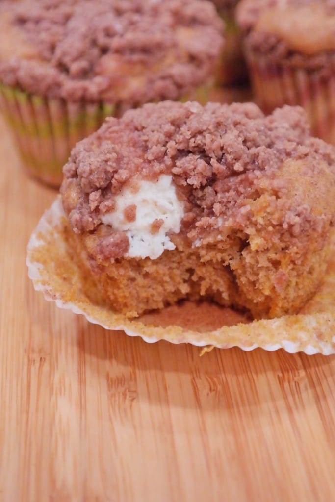 Pumpkin muffins with cream cheese and crumble topping just out of the oven