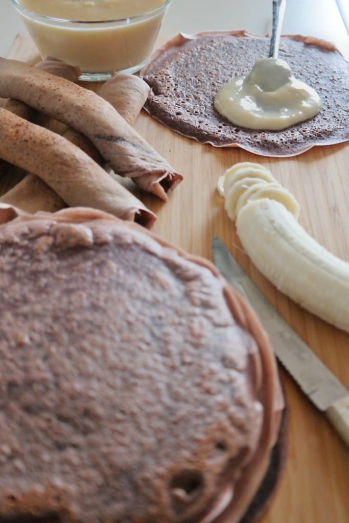 Chocolate pancakes with vanilla pudding