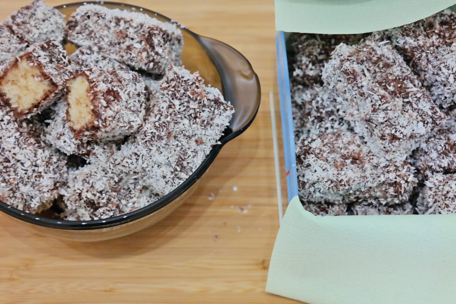 Coconut Lamington cake pieces served on a plate and in a baking dish