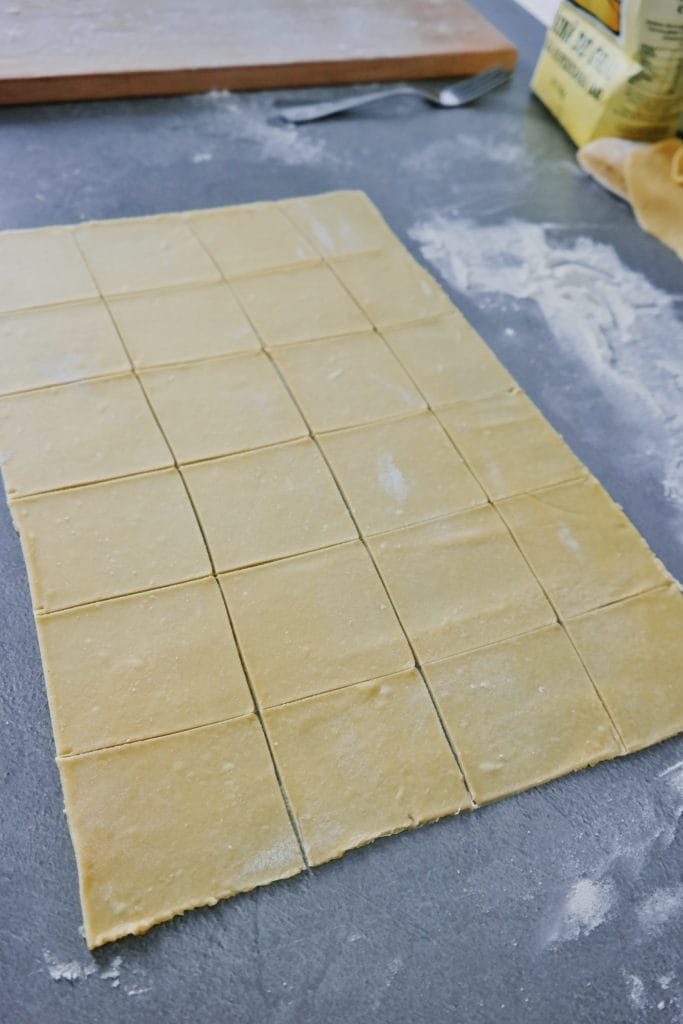 Pasta dough cut into squares