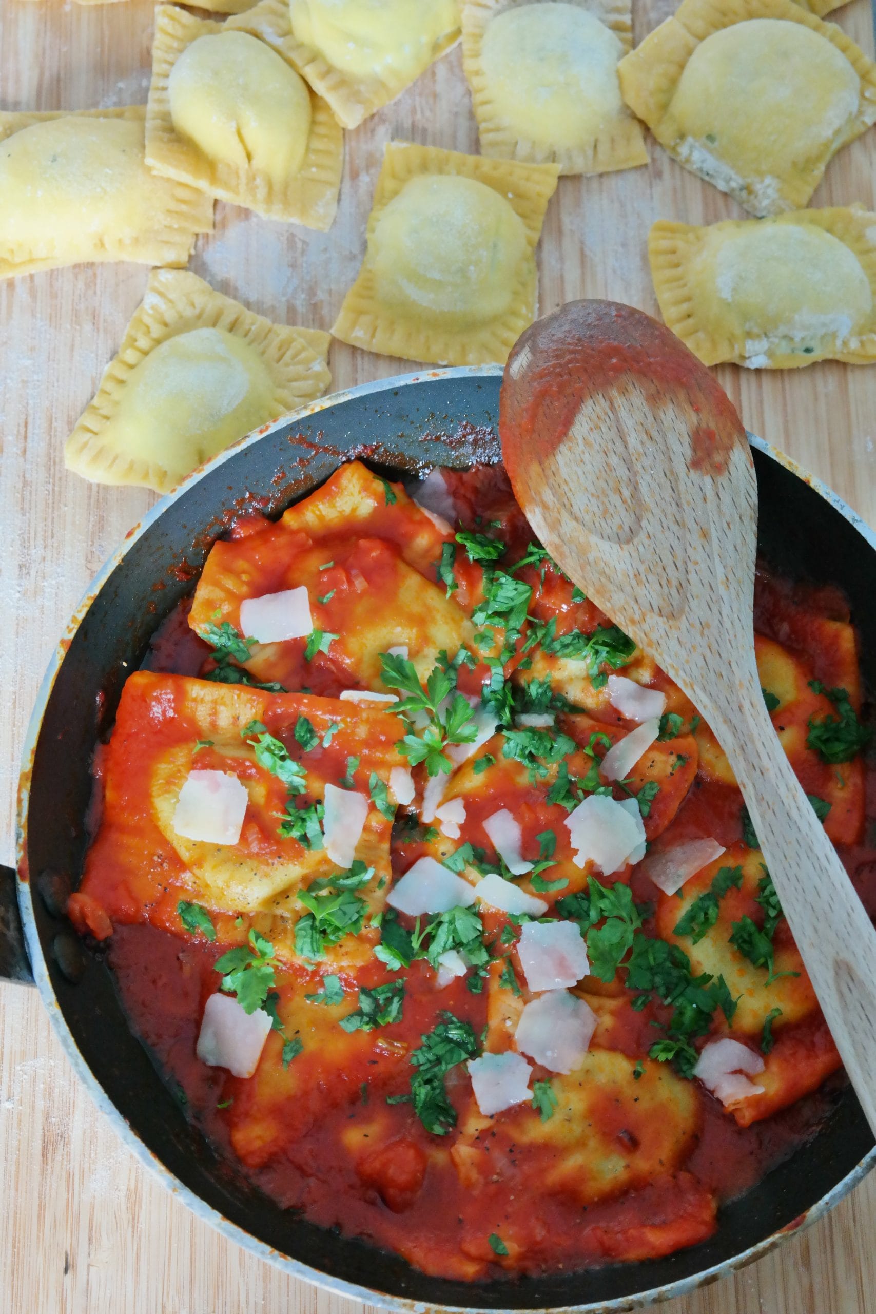 Homemade ravioli with tomato sauce