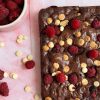 Freshly baked white chocolate raspberry brownie in a baking pan