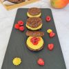 Brownie sandwich cookies with mango ganache