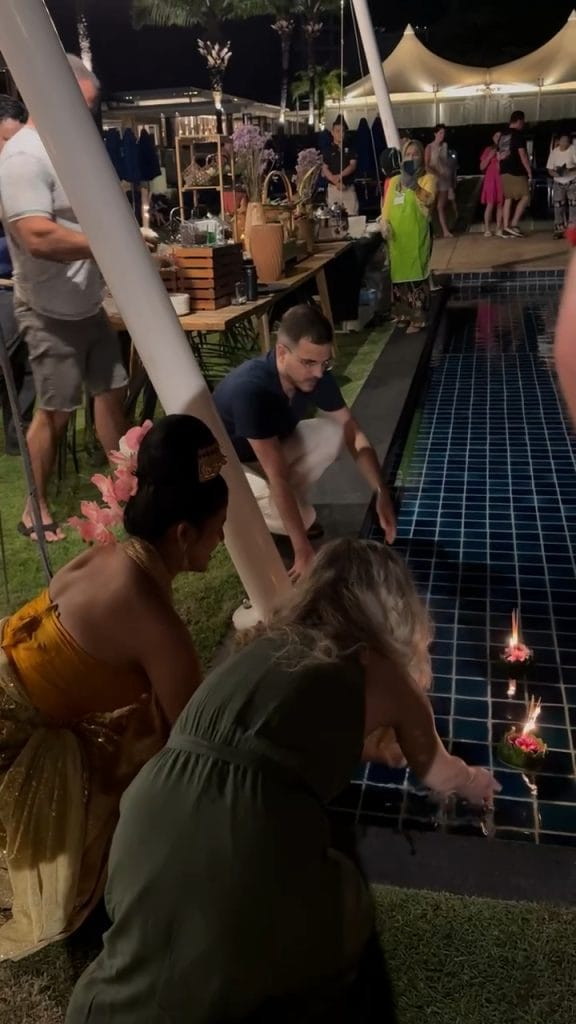 A traditional moment during the Loy Krathong festival, Phuket, Thailand