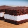 Homemade Kinder Milk Slice with soft chocolate sponge layers and milk cream