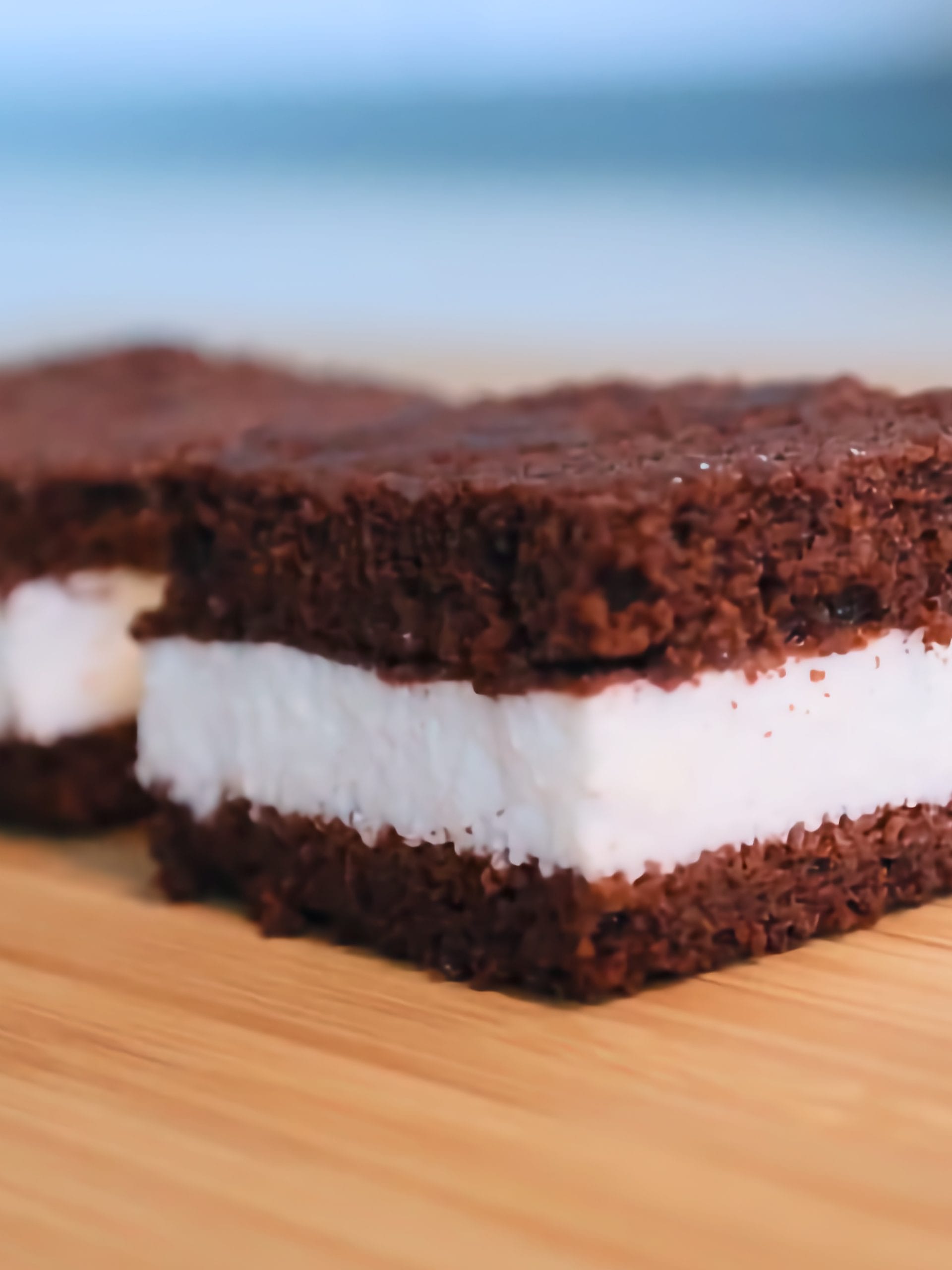 Homemade Kinder Milk Slice with soft chocolate sponge layers and milk cream
