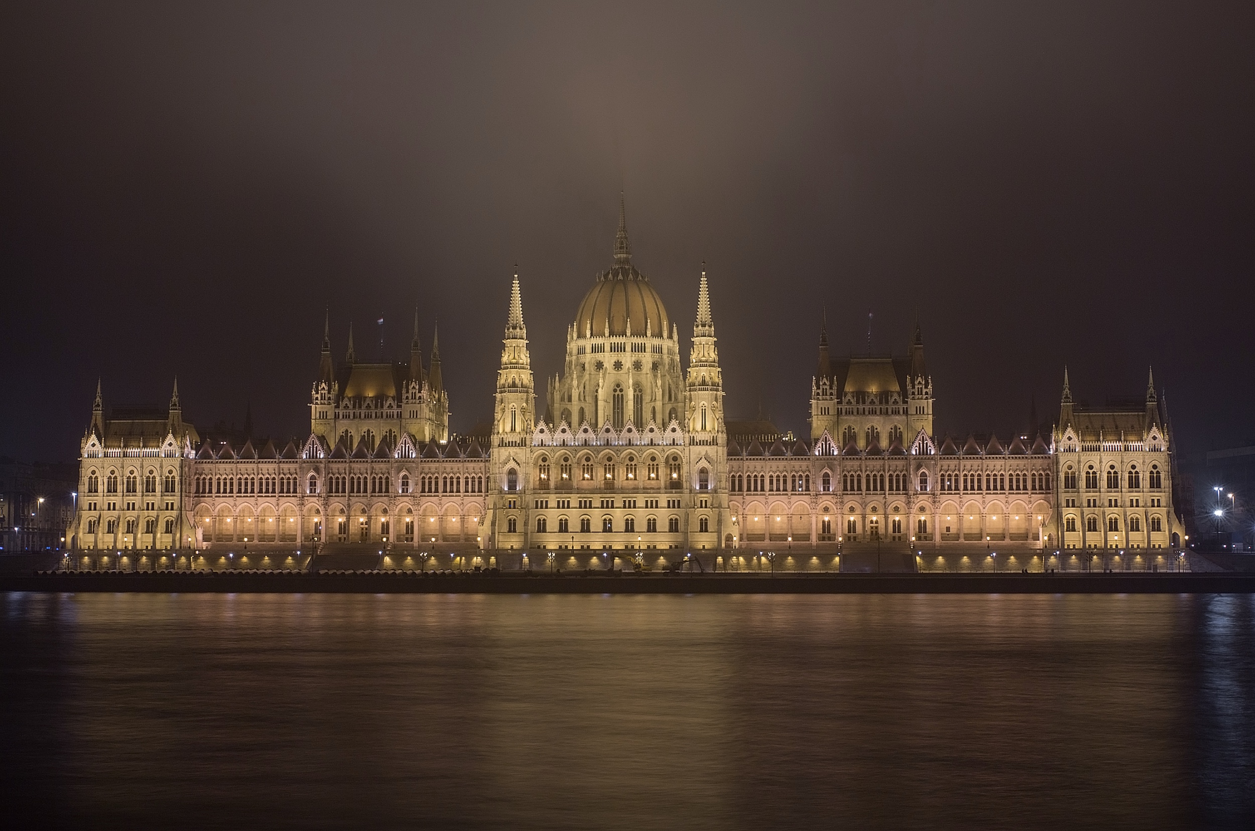 Budapest’s illuminated Parliament building across the Danube at night
